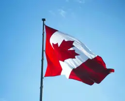 canadian flag blowing in the wind